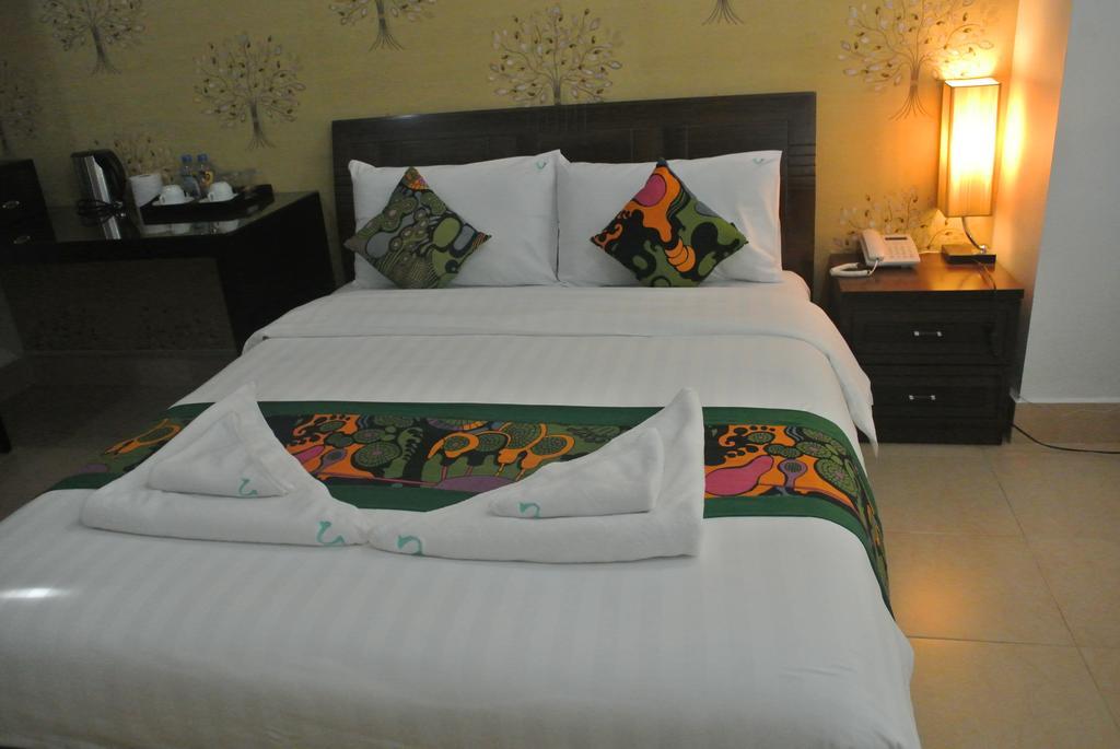 New Usouk Boutique Hotel Vientiane Room photo